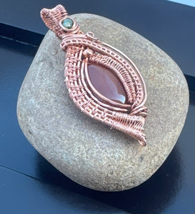 Handcrafted Wire-Wrapped Carnelian Gemstone with green accent Bead Pendant