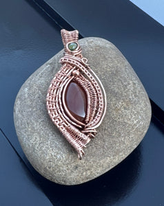 Handcrafted Wire-Wrapped Carnelian Gemstone with green accent Bead Pendant